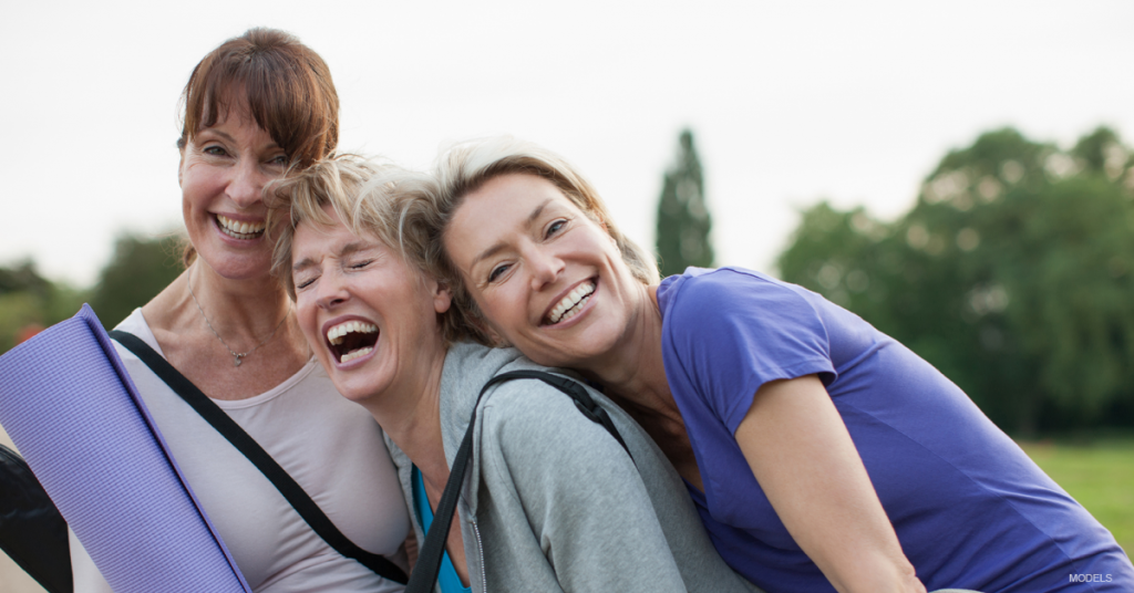 Group of women outdoors laughing