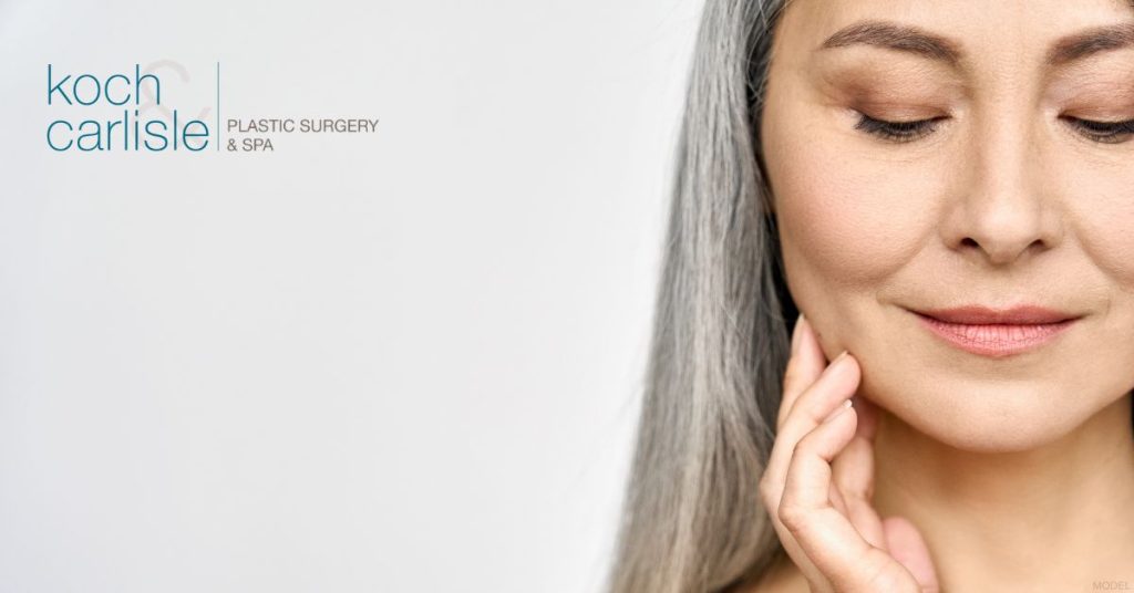 Woman enjoying her facelift results (model)